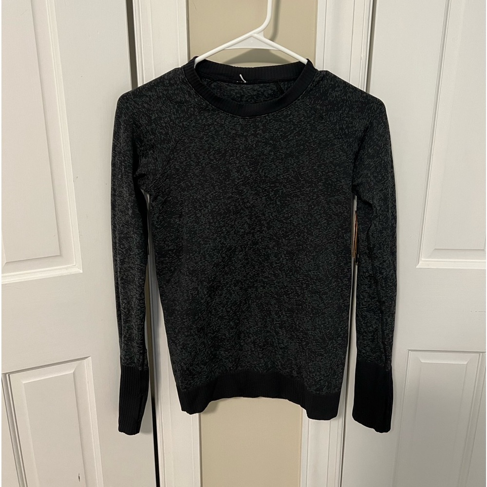 Size 6 lululemon long sleeve. Camo like print